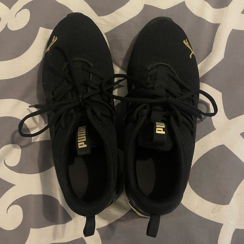 Black puma sneakers